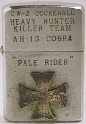 1960 Zippo that belonged to Chief Warrant Office (CW-2) Cockerall. Hunter Killer Teams in Vietnam consisted of AH-1G Cobra and one OH-6A Helicopter working together. It also reads "Pale Rider" and has an attached cross that reads "Blue Max - 25 Kill…