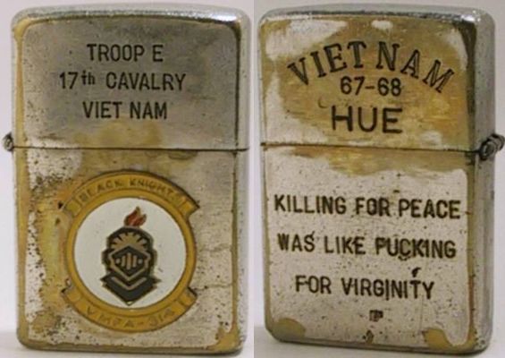 1967 Zippo for "Troop E, 17th Cavalry Viet Nam" with attached badge for the Black Knights VMFA-314&nbsp;.&nbsp; The back reads "Vietnam 67-68 Hue Killing for Peace Was Like Fucking For Virginity".&nbsp; While a genuine Zippo, the attachment and engr…