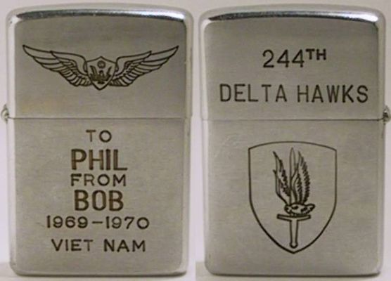 1969 Zippo engraved with wings and "To Phil From Bob 1969-1970 Viet Nam".&nbsp; The reverse reads "244th Delta Hawks" with the insignia of the 1st Aviation Brigade