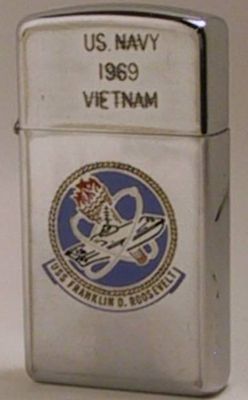 1969 slim Zippo that reads"Navy 1969 Vietnam" with the emblem ofUSS Franklin D. Roosevelt. The reverse reads "TF 115" or Task Force 115 or Operation Market Time, the effort to block the flow of arms and supplies into South Vietnam